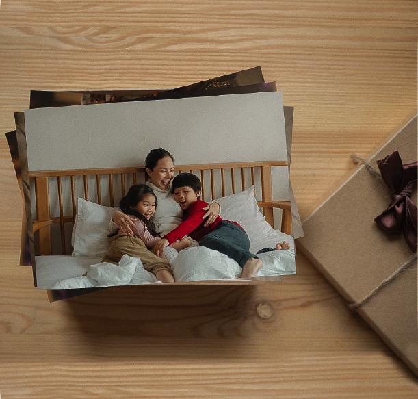 Photo books, prints, and framed photographs displayed in a Japanese-inspired home, showcasing high-quality photo printing in Japan.